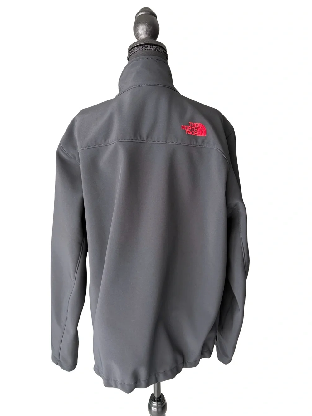 The North Face Men's Black Jacket with Red Accents